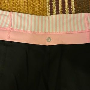 Lululemon Groove Flared Pants Size 8 pink and black